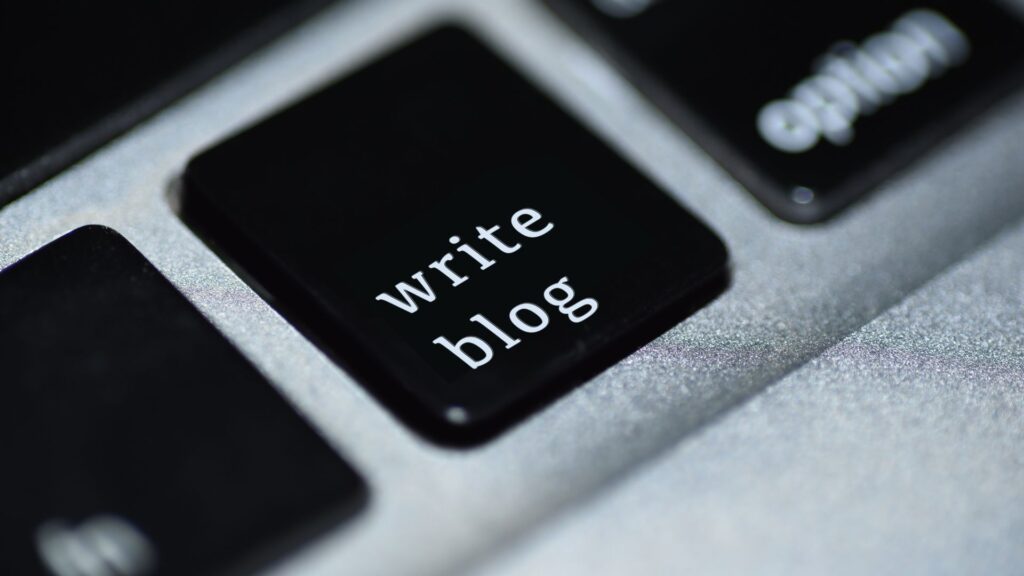 button on a keyboard that represents writing a blog quickly at the push of a button