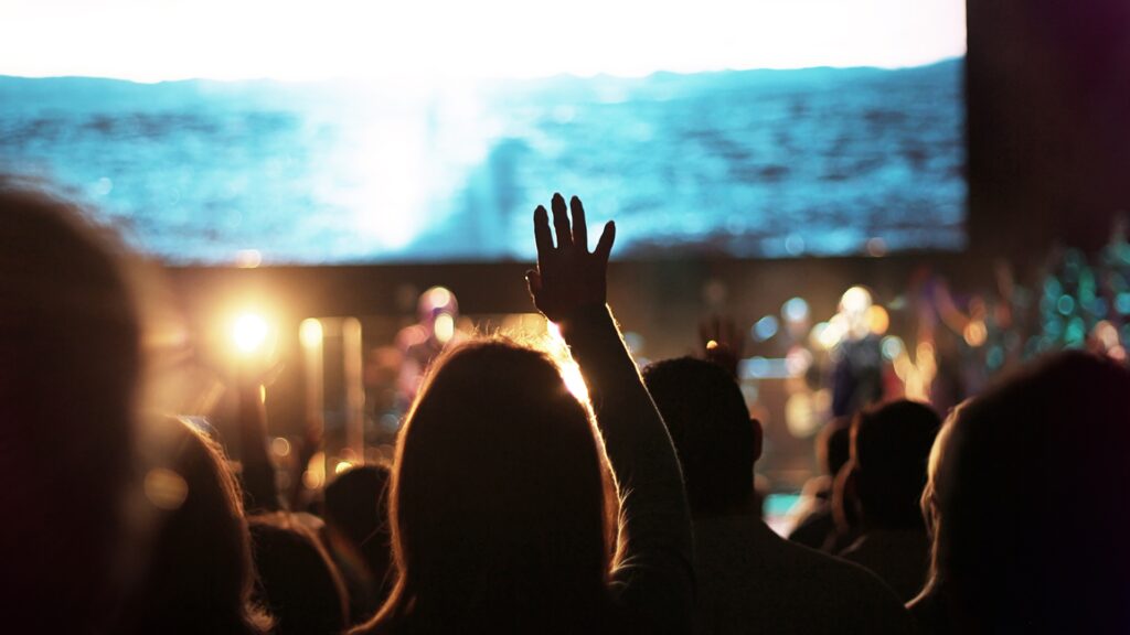 Image of people praising God in a Church Sanctuary setting representing work in the Nicola Content project portfolio